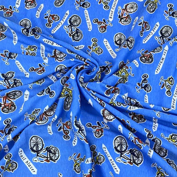 Bicycles on Blue 100% Cotton T-Shirt Knit. Sold in 1/2 Yard Increments