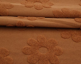 Caramel Jacquard Daisy Terry Knit. Sold by the 1/2 Yard