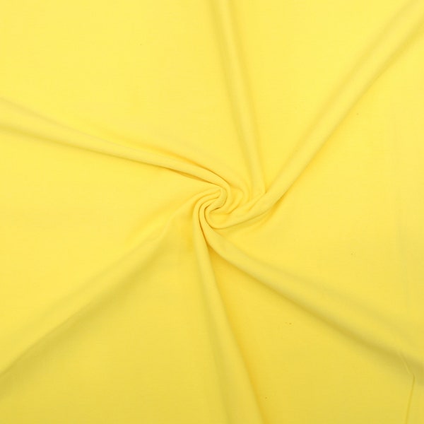 KNIT Fabric: Light Yellow Cotton Spandex knit. Sold in 1/2 Yard Increments