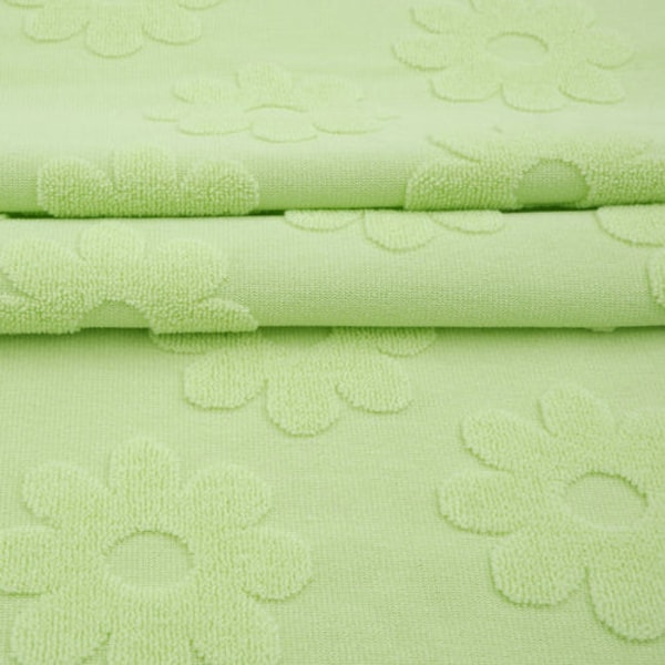 Light Lime Jacquard Daisy Terry Knit. Sold by the 1/2 Yard
