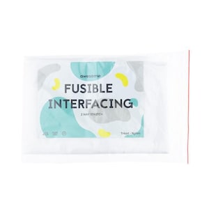 May include: A package of fusible interfacing with the word "awesome" above the text "FUSIBLE INTERFACING". The text is in white, with a teal and gray abstract design. The words "2 WAY STRETCH" are below the main text. The package is sealed with a red zipper.