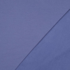 May include: Two sections of fabric in a periwinkle blue hue. The left side has a ribbed texture, while the right side is smooth. The fabric appears to be a knit material, suitable for apparel or home decor projects.