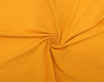 KNIT Fabric: Solid Mustard Cotton Spandex knit. Pricing by the 1/2 yard