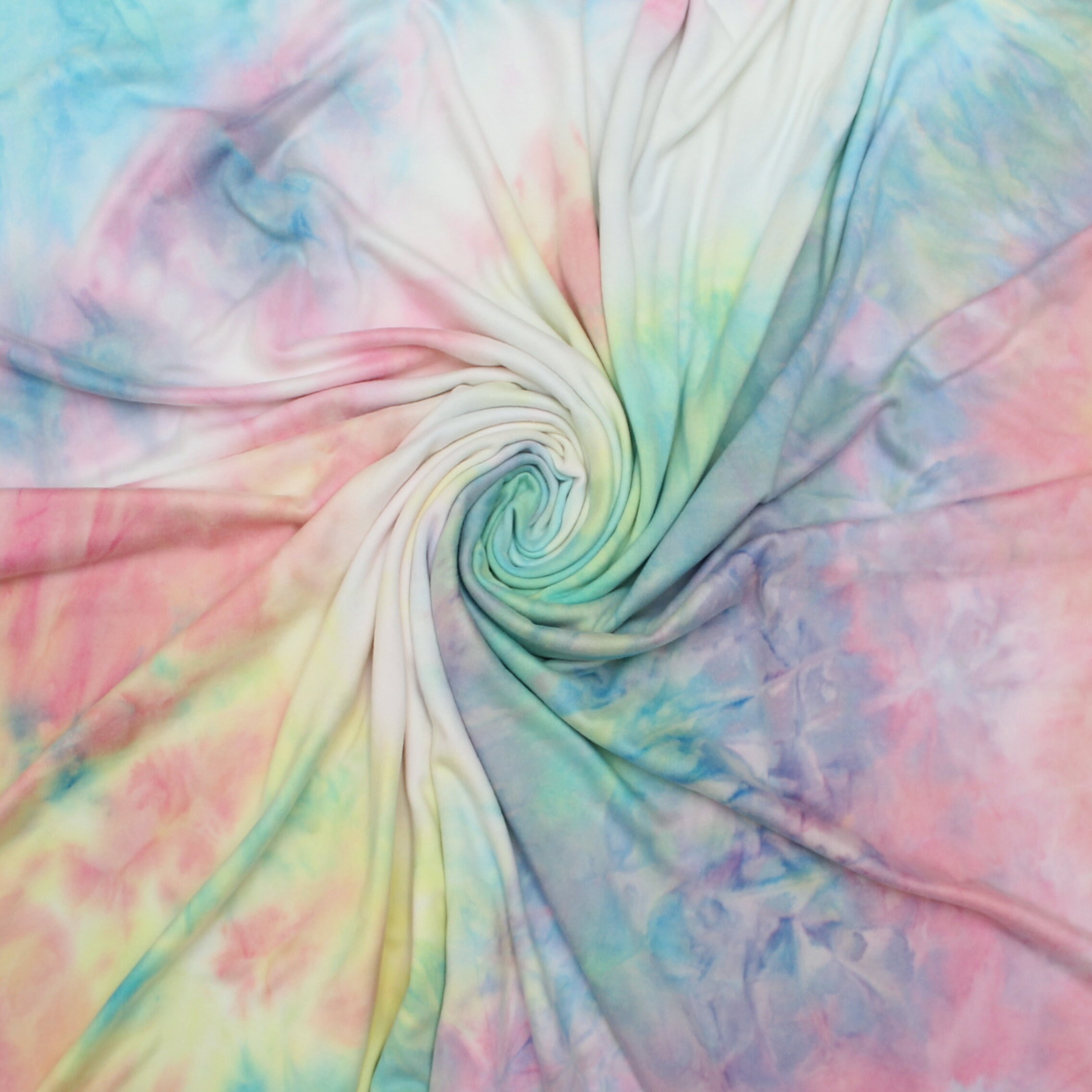 Rainbow Tie Dye Double Brushed Poly.  Sold by the 1/2 yard