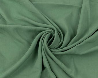 Olive Rayon Challis. Pricing by the 1/2 yard