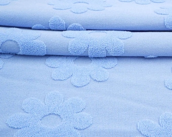 Light Blue Jacquard Daisy Terry Knit. Sold by the 1/2 Yard