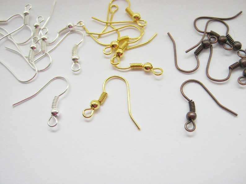 24 PcS EaRRiNg FiNdiNgS JeWeLRy MaKiNg FReNcH FiSH HooK SiLvERToNe ChArMs 19mm