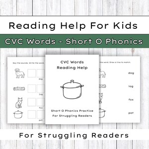 May include: A stack of three white worksheets for kids with the text "Reading Help For Kids" and "CVC Words - Short O Phonics". The worksheets feature illustrations of a dog, log, fox, and pot, with fill-in-the-blank exercises. The text "For Struggling Readers" is also visible.