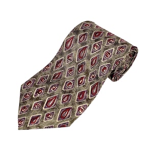 May include: A patterned necktie featuring a repeating diamond design. The diamonds are filled with maroon and white shapes, set against a muted olive green background. The tie is made of a smooth fabric.