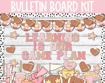May include: A bulletin board kit with a pink and brown color scheme. The kit includes a banner with footballs and hearts, a sign that says "Learning is our game plan", and various other football-themed decorations.