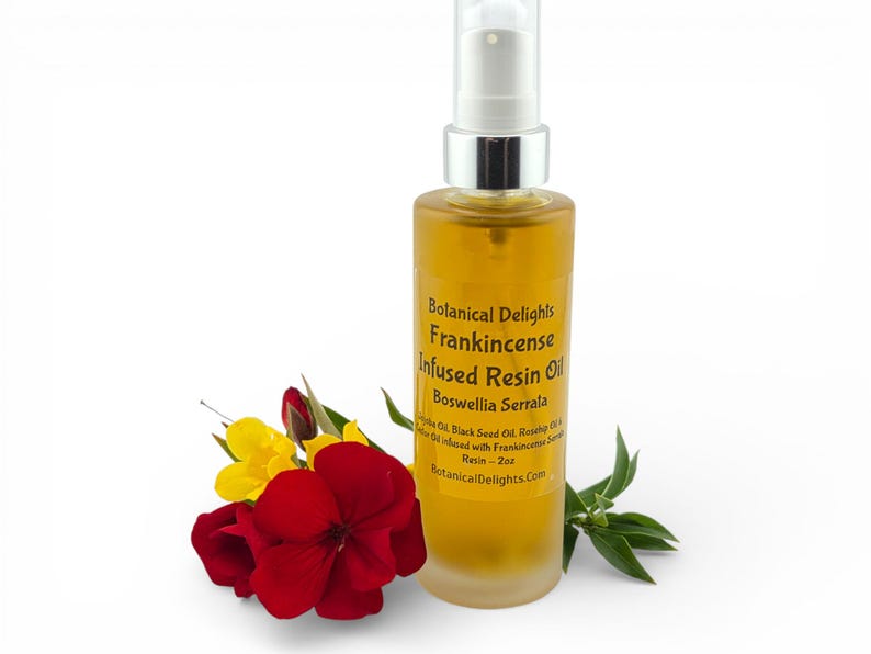 a bottle of Frankincense Resin Oil surrounded by a red flower and green leaves.