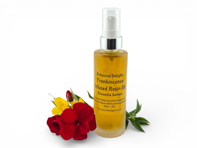 a bottle of Frankincense infused resin oil surrounded by red and yellow flowers, with a white background.