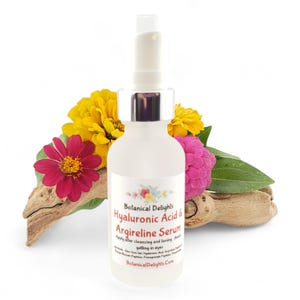 a bottle of hygiezing solution next to flowers