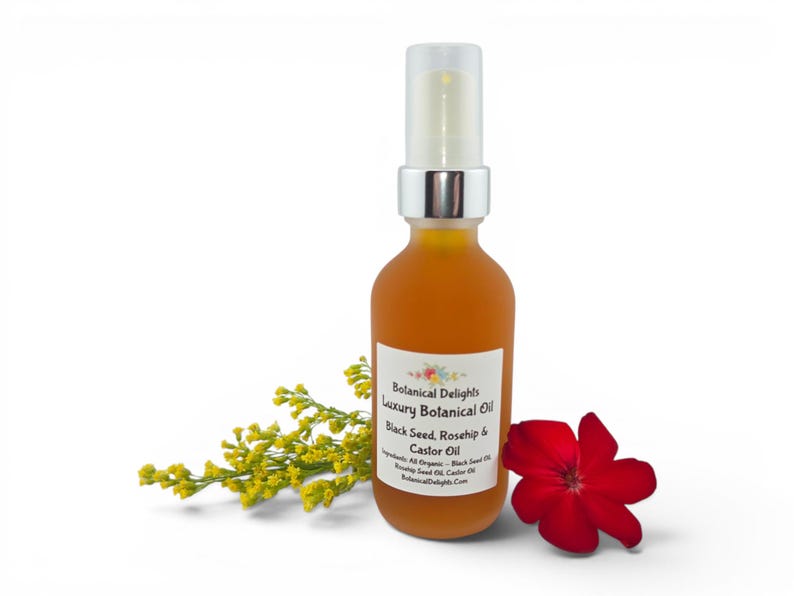 May include: A bottle of Botanical Delights Luxury Botanical Oil with a white label, a yellow flower, and a red flower. The label lists the ingredients as Black Seed, Rosehip & Castor Oil.
