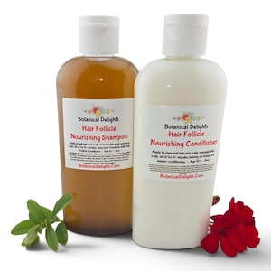 May include: Two clear plastic bottles with white flip-top caps. One contains amber-colored Hair Follicle Nourishing Shampoo, the other white Hair Follicle Nourishing Conditioner. Labels feature the Botanical Delights logo, text, and ingredients.