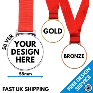May include: Three medals with red ribbons. The medals are gold, silver, and bronze. The silver medal has the text "YOUR DESIGN HERE" on it. The medals are 58 mm in diameter.