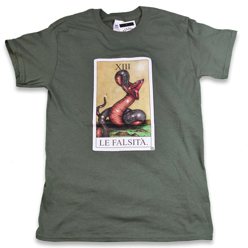 May include: A green t-shirt with a tarot card design featuring a snake with a red head and the text "XIII LE FALSIT&Agrave;."