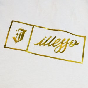 May include: Gold-colored logo with the text "illeggo" in a cursive font and a stylized letter "I" in a box.