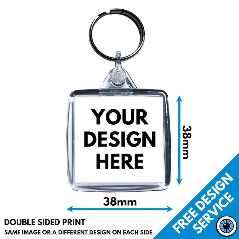 May include: A clear plastic keychain with a square-shaped photo insert. The keychain is 38 mm wide and 38 mm tall. The text "YOUR DESIGN HERE" is printed on the photo insert.