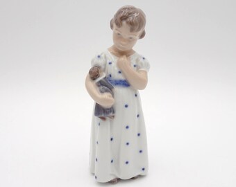 Royal Copenhagen Porcelain Figurine: Girl with Doll No. 3539