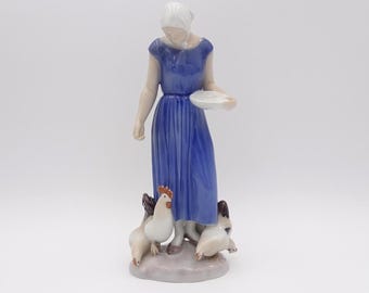 Bing and Grondahl Porcelain Figurine: Girl Feeding Chickens No. 2220, Designer Axel Locher
