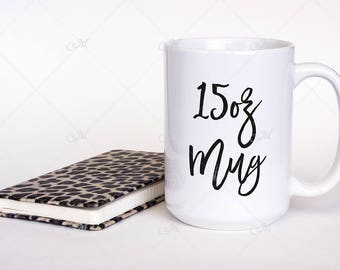Download Free 15 oz White Mug Mockup. White mug w/ Notebook. PSD + JPG PSD Template