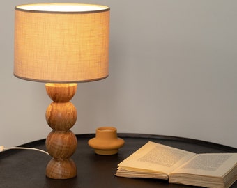 Organic Brilliance: Handcrafted Olive Wood Table Lamp with Stunning Spherical Design - Illuminate Your Space with Timeless Elegance"