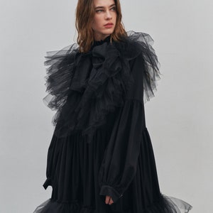 Black maxi dress with frills and smocking. Black designer gown.