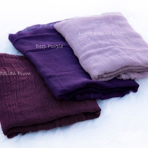 May include: Three fabric swatches in shades of purple. The top swatch is a light lavender color labeled "Light French Lilac". The middle swatch is a deep purple color labeled "Deep Purple". The bottom swatch is a dark burgundy color labeled "Italian Plum".