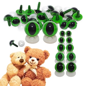 May include: A selection of green and black plastic craft eyes with green stems and white washers. The eyes are in various sizes and are shown with two teddy bears. The eyes are for crafts and toy making.