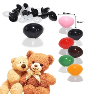 May include: Assortment of colourful plastic safety eyes for stuffed animals. The eyes are 18 mm in diameter and 14 mm in height. The eyes come in a variety of colours, including pink, red, brown, green, and orange. The eyes are also available in black.
