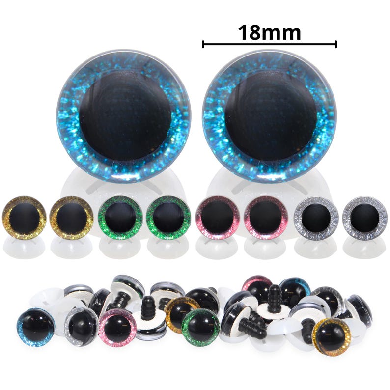May include: A collection of craft eyes in various colors, including blue, gold, green, pink, and silver. The blue eyes are 18mm in diameter. The eyes have a black pupil and a glittery, reflective outer ring. Some eyes have white plastic backings.