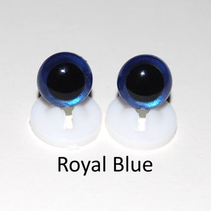 May include: Two royal blue plastic safety eyes with black pupils, mounted on white plastic bases.  Royal Blue.