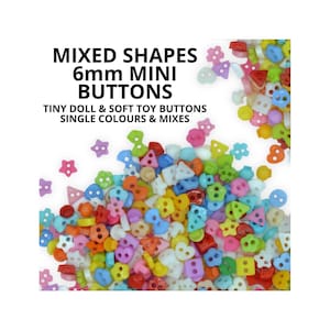 May include: A selection of mixed-shape mini buttons, each about 6mm in size, in a variety of bright colours. The buttons are in shapes such as stars, flowers, and bows. Text on the image reads: "MIXED SHAPES 6mm MINI BUTTONS TINY DOLL & SOFT TOY BUTTONS SINGLE COLOURS & MIXES."