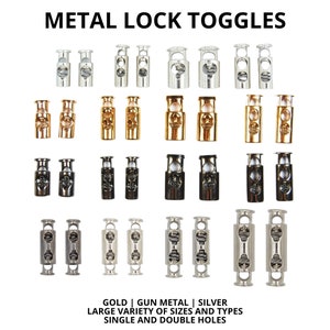 Op de afbeelding: Assortiment van metalen vergrendelingsknoppen in goud, gunmetal en zilver. De knoppen zijn verkrijgbaar in verschillende maten en hebben een of twee gaten.