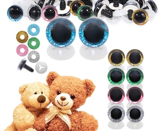 Puede incluir: Una colección de varios suministros para manualidades, que incluyen ojos de seguridad de plástico en múltiples colores y tamaños, junto con arandelas brillantes y sujetadores. También se ven dos osos de peluche, lo que sugiere un tema de manualidades o fabricación de juguetes.