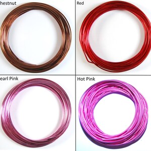 May include: Four spools of wire in different colors: chestnut, red, pearl pink, and hot pink. The wire is coiled in a circle.