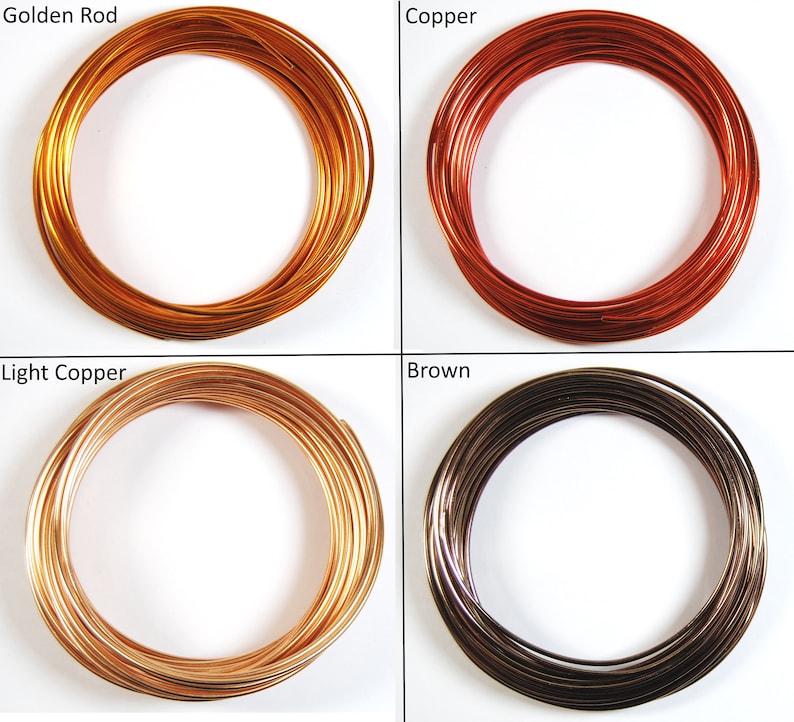 May include: Four spools of wire in different colors: golden rod, copper, light copper, and brown. The wire is coiled in a circle.