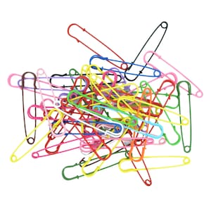 May include: A pile of colorful safety pins in various sizes. The pins are made of metal and have a shiny finish. They are arranged in a random pattern.