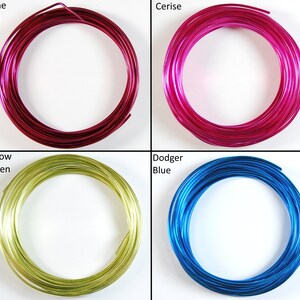May include: Four spools of colorful aluminum wire. The colors are wine red, cerise, yellow green, and dodger blue.