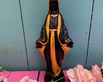 Black and gold Madonna statue