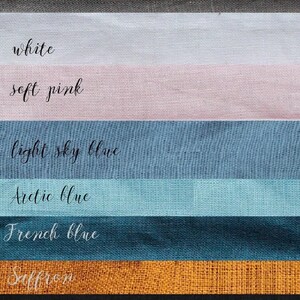 May include: A swatch card showing 12 different fabric colors, including pastel rose, cappuccino, gray, white, soft pink, light sky blue, arctic blue, French blue, saffron, deep indigo blue, soft lavender, and soft violet.