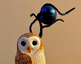 Barn Owl perched under a Blue Moon