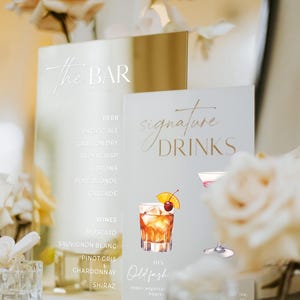 May include: A bar menu with the words "The BAR" in elegant script. The menu lists beer, wines, and signature drinks, including an Old Fashioned cocktail illustration. The background features floral arrangements.