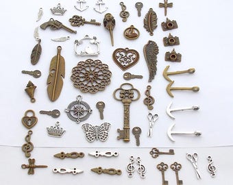 lot 53 pendant charm bronze silver key feather leaf key floor heart skull bird butterfly anchor