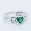 Sterling Silver Claddagh ring set with emerald green heart shaped stone, may birthstone claddagh ring from Ireland