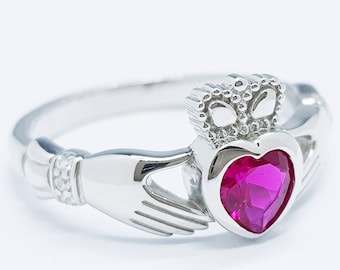 Sterling Silver Claddagh ring set with ruby red heart shaped stone, July birthstone claddagh ring