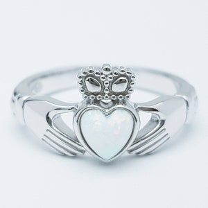 Sterling Silver Claddagh ring set with white opal heart, October birthstone image 1