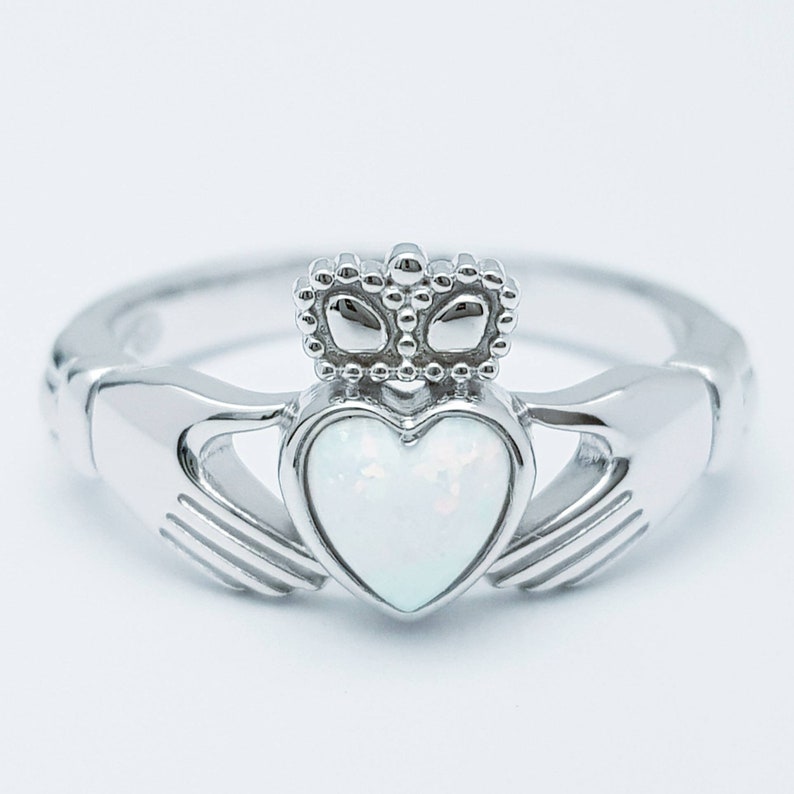 Sterling Silver Claddagh ring set with white opal heart, October birthstone image 1