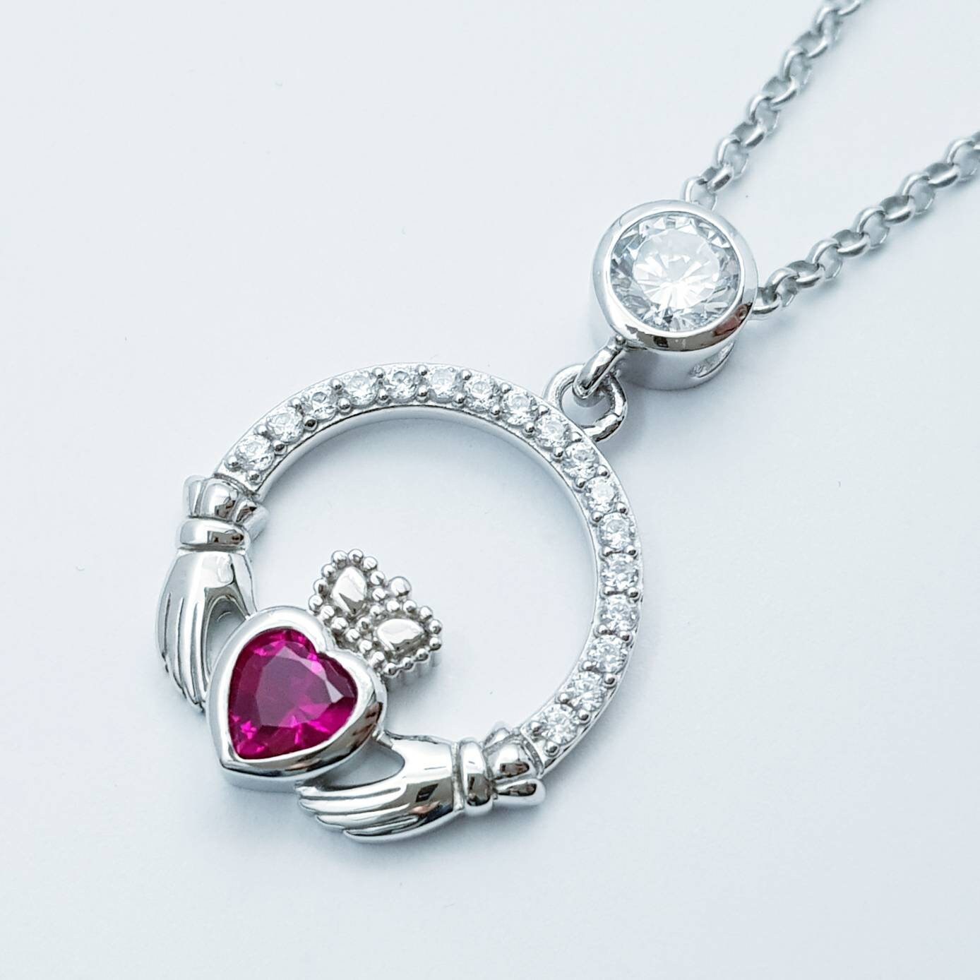 Sterling Silver Claddagh Necklace Set With Ruby Red July